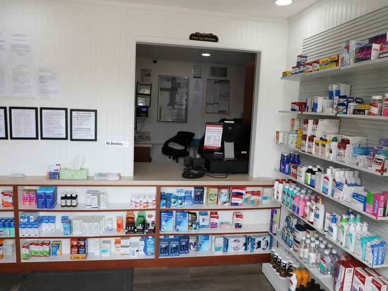 Pharmacy 1 prescription pickup window with OTC products